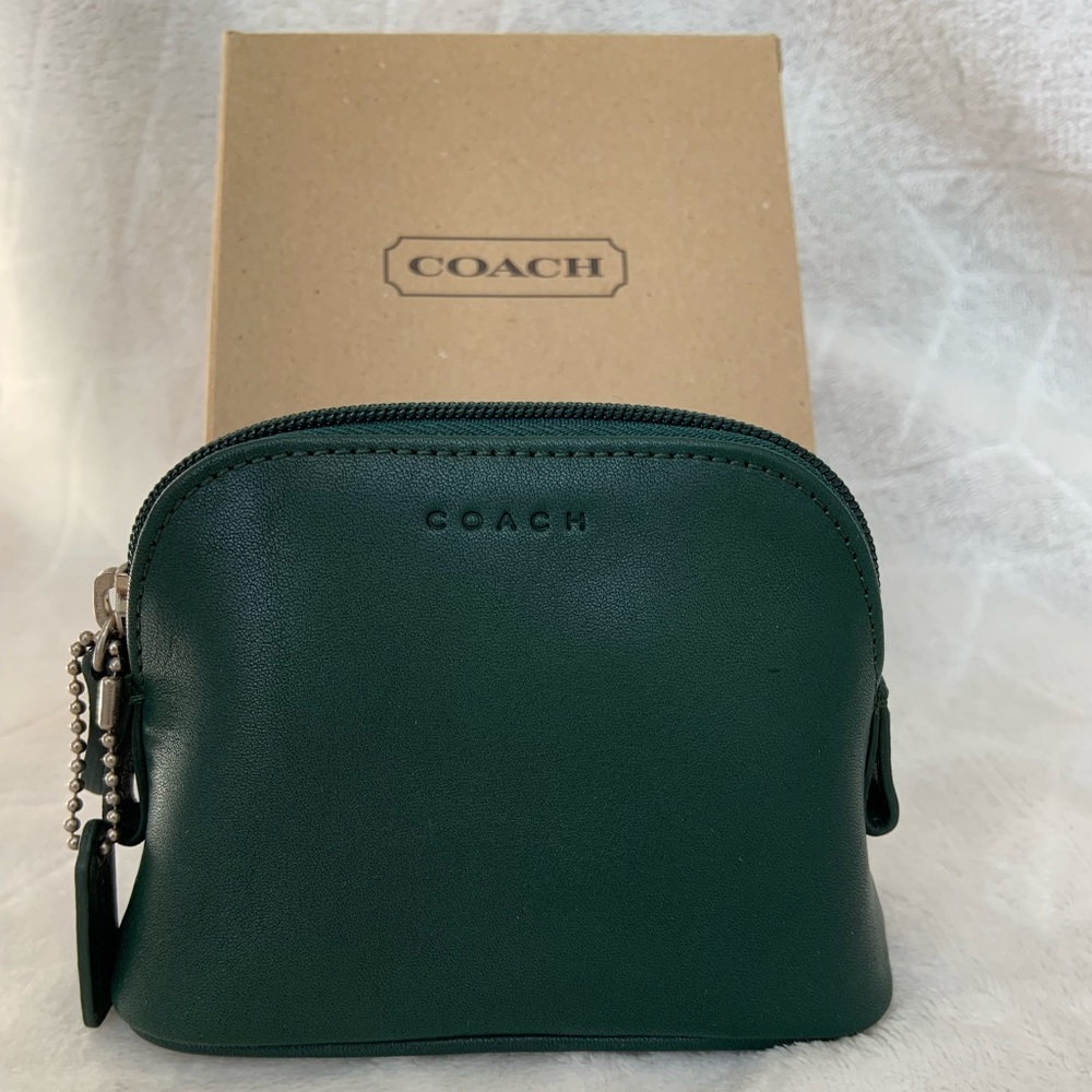Vintage Coach coin purse in deep green leather.